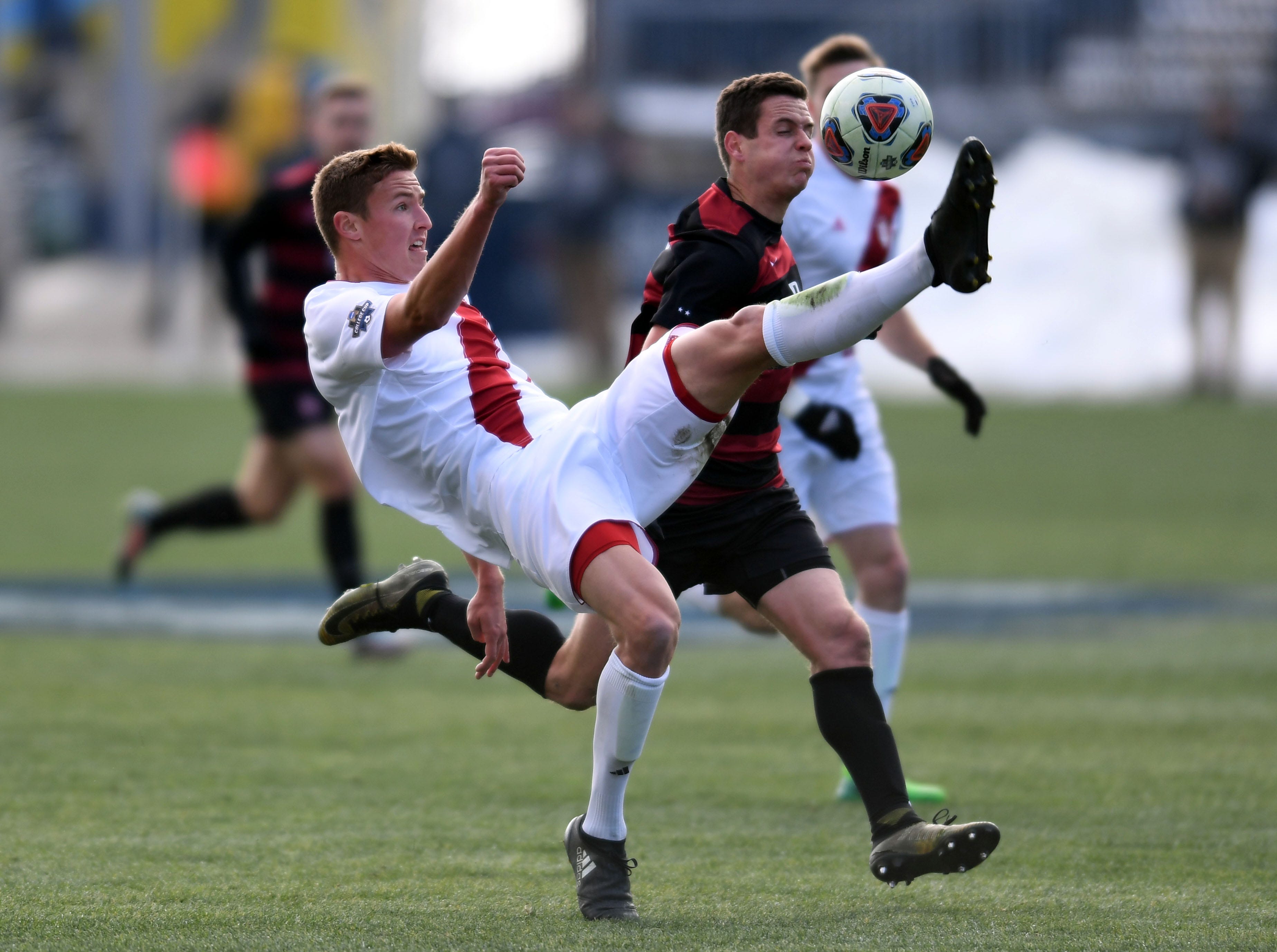 male soccer players wearing sports bras